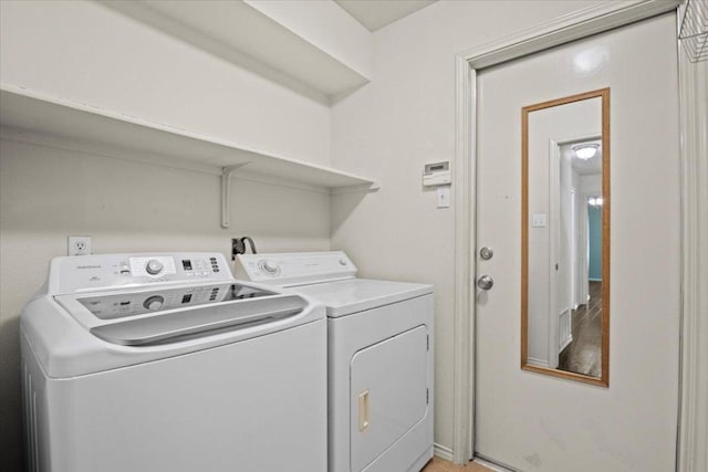 laundry room featuring laundry area and washing machine and dryer