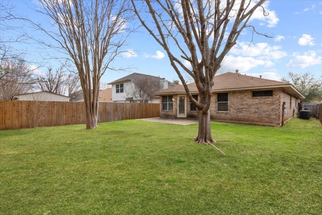 view of yard with a fenced backyard and a patio area