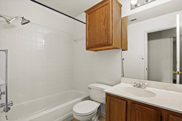 bathroom featuring tub / shower combination, visible vents, toilet, and vanity