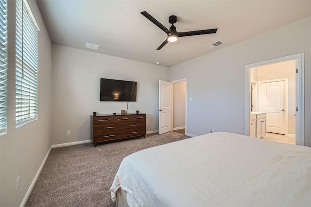 bedroom with ceiling fan, carpet, visible vents, and baseboards