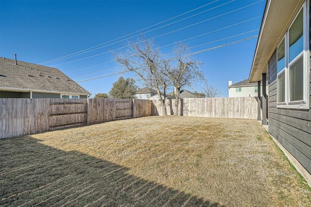 view of yard featuring a fenced backyard