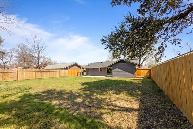 view of yard featuring a fenced backyard