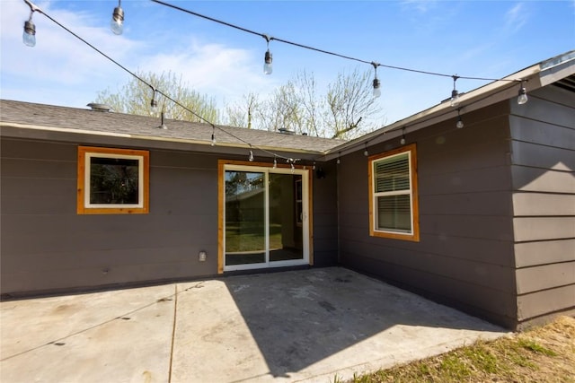 back of property featuring a patio area