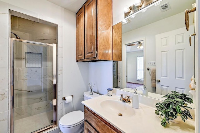 410 Rolling Green Dr, Lakeway, TX 78734 - bathroom featuring a shower stall, vanity, and toilet