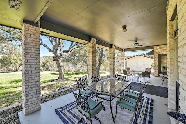 410 Rolling Green Dr, Lakeway, TX 78734 - view of patio / terrace with outdoor dining space and ceiling fan