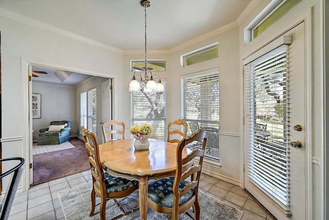 410 Rolling Green Dr, Lakeway, TX 78734 - dining room featuring light tile patterned floors, crown molding, a chandelier, and baseboards