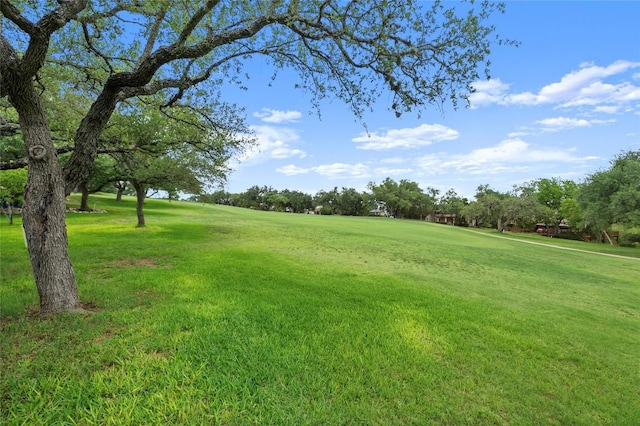 410 Rolling Green Dr, Lakeway, TX 78734 - view of green lawn featuring view of golf course and view of scattered trees