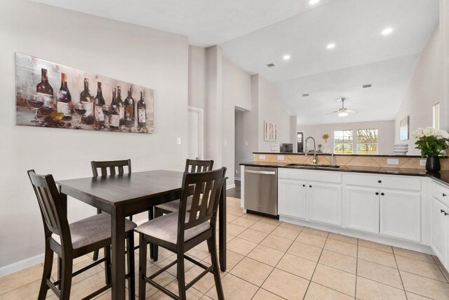 dining room with high vaulted ceiling, a ceiling fan, recessed lighting, light tile patterned floors, and baseboards