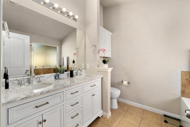 full bathroom with double vanity, visible vents, toilet, and a sink