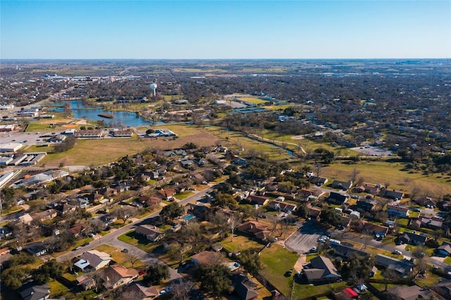 bird's eye view featuring a residential view and a water view