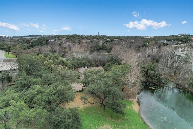 drone / aerial view with a view of trees