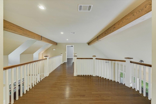 corridor featuring lofted ceiling with beams, recessed lighting, wood finished floors, and visible vents