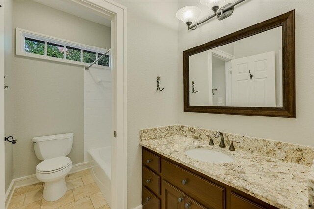 full bathroom with vanity, shower / bathing tub combination, toilet, and baseboards