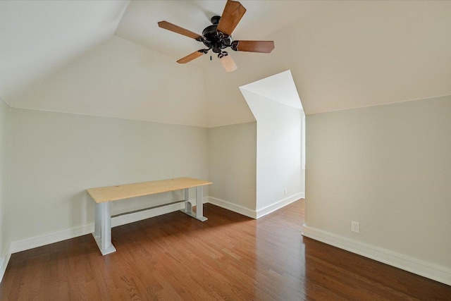 bonus room with ceiling fan, baseboards, lofted ceiling, and wood finished floors