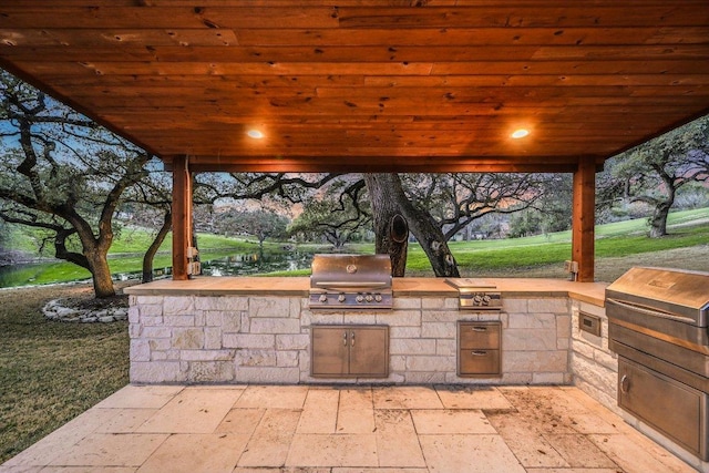 view of patio with a grill and exterior kitchen