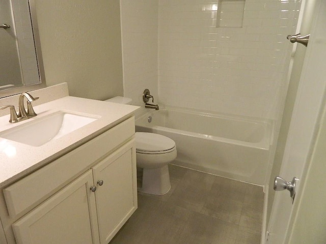 full bathroom featuring vanity, toilet, and washtub / shower combination