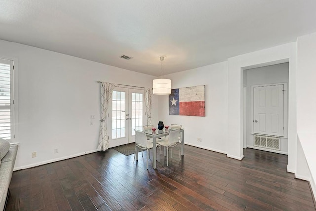 1000 Rutgers Dr, Pflugerville, TX 78660 - dining space featuring french doors and dark wood-type flooring