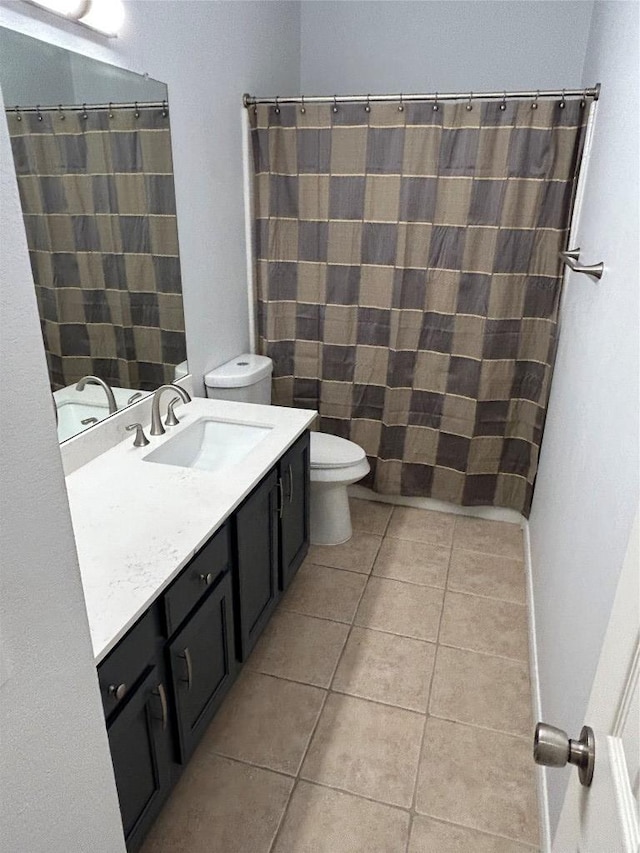 1000 Rutgers Dr, Pflugerville, TX 78660 - full bath with tile patterned floors, vanity, and a shower with shower curtain