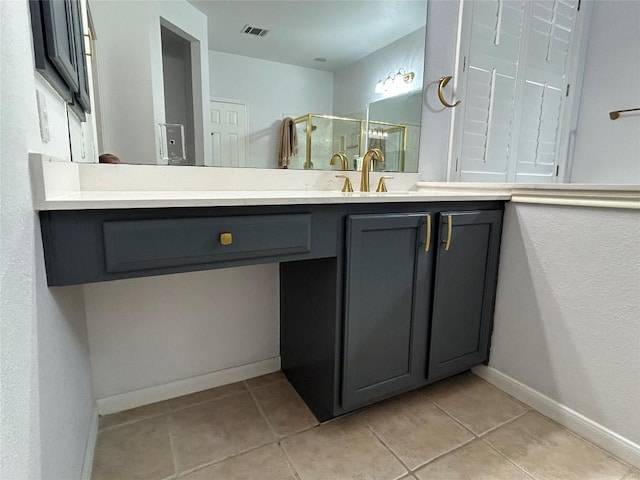 1000 Rutgers Dr, Pflugerville, TX 78660 - bathroom featuring a stall shower, vanity, and tile patterned flooring