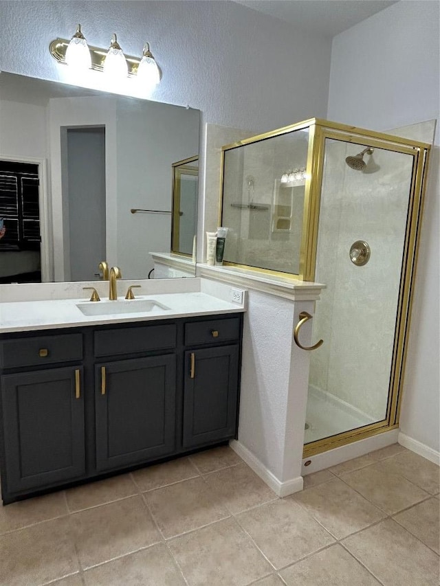 1000 Rutgers Dr, Pflugerville, TX 78660 - full bath with tile patterned floors, a stall shower, and vanity