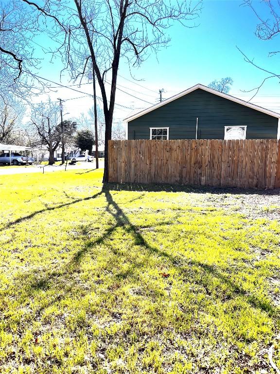 view of yard featuring fence