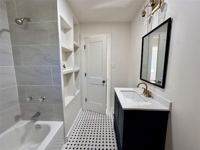 bathroom with shower / washtub combination, vanity, and baseboards