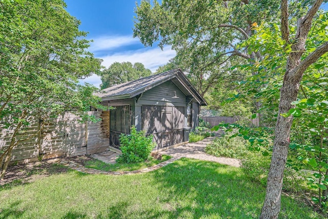 view of shed with a fenced backyard