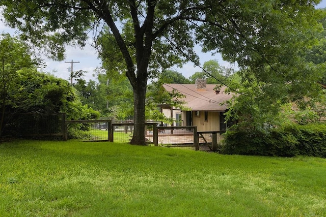 view of yard with fence