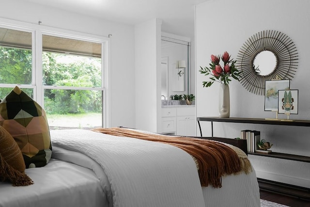 bedroom with wood finished floors