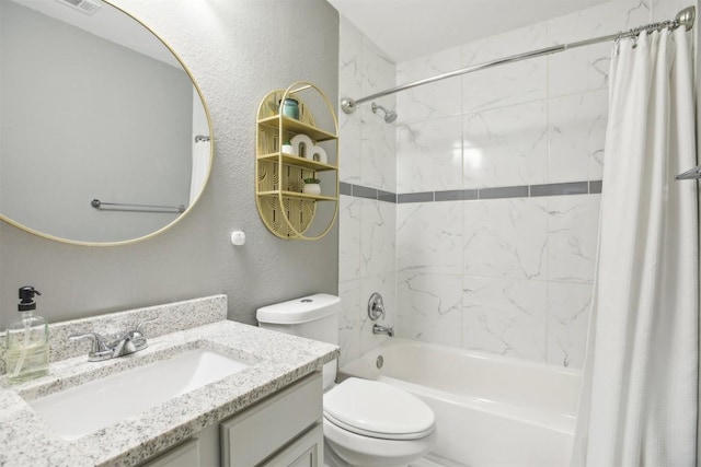 bathroom featuring vanity, toilet, a textured wall, and shower / tub combo with curtain