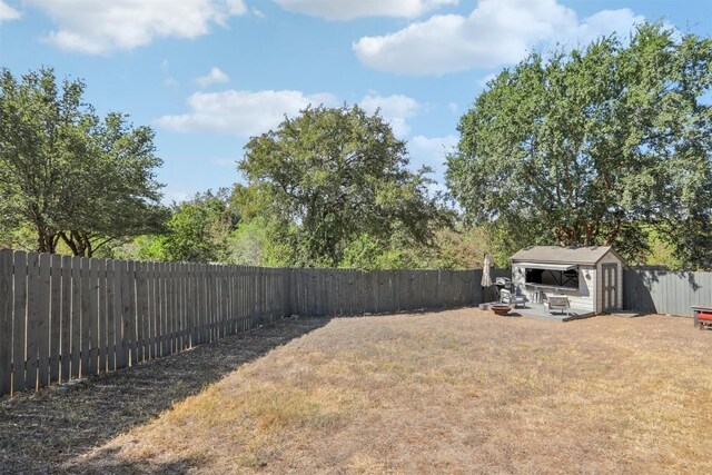 1505 Curameng Cv, Austin, TX 78748 - fenced backyard featuring a storage unit