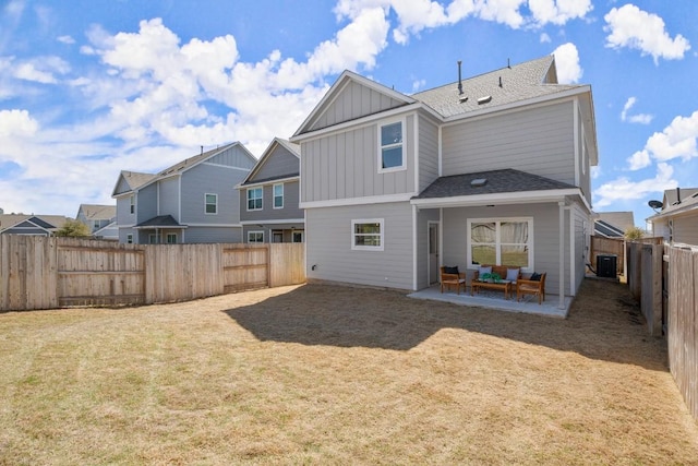 112 High Plains Pass, Liberty Hill, TX 78642 - back of house featuring board and batten siding, outdoor lounge area, a shingled roof, a patio area, and a residential view