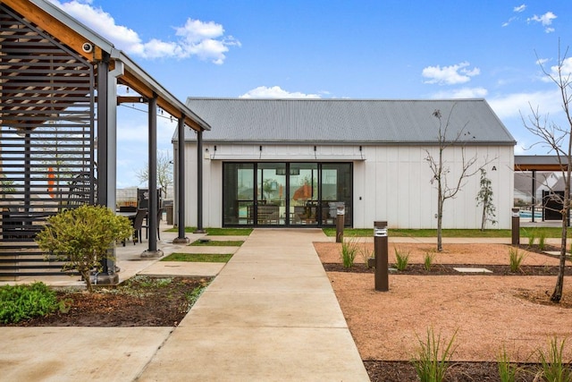 112 High Plains Pass, Liberty Hill, TX 78642 - view of exterior entry with metal roof