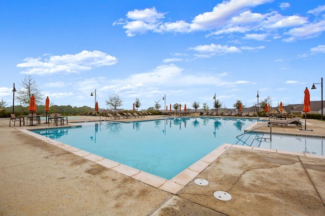 112 High Plains Pass, Liberty Hill, TX 78642 - community pool with a patio