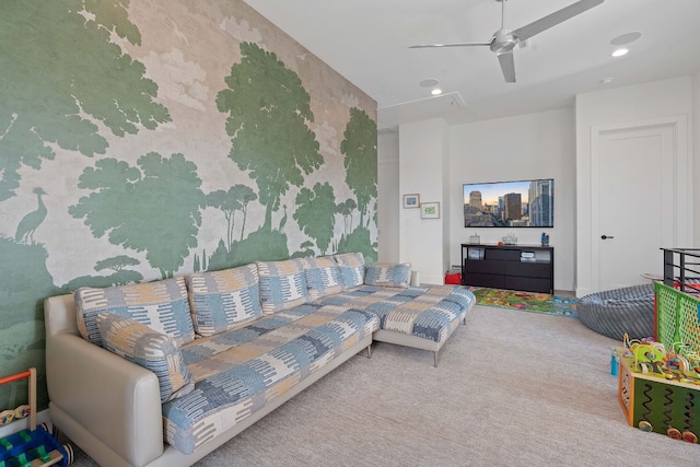 carpeted living room with recessed lighting and a ceiling fan