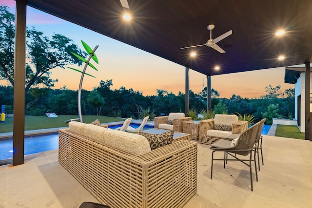 view of patio featuring outdoor lounge area and ceiling fan