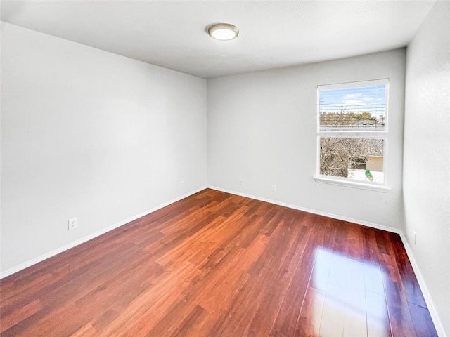 3128 Flinders Reef Ln, Austin, TX 78728 - empty room with wood finished floors and baseboards