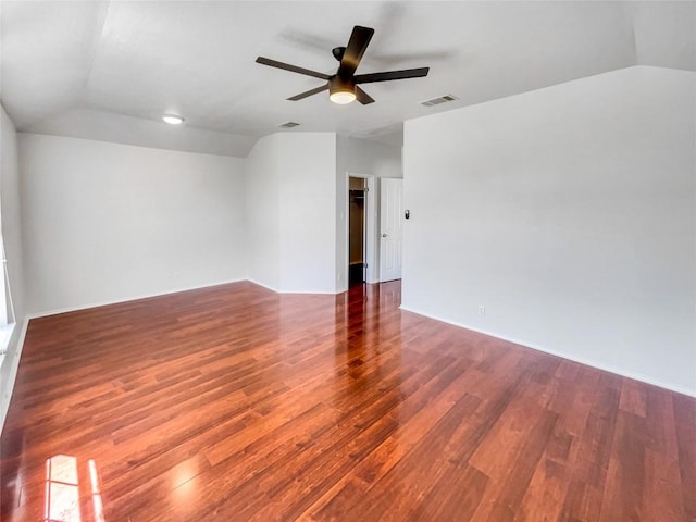 3128 Flinders Reef Ln, Austin, TX 78728 - unfurnished room with vaulted ceiling, wood finished floors, and a ceiling fan