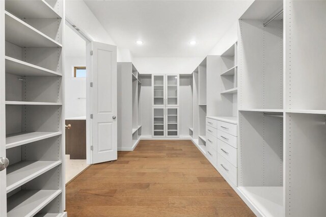 walk in closet featuring light wood-style floors