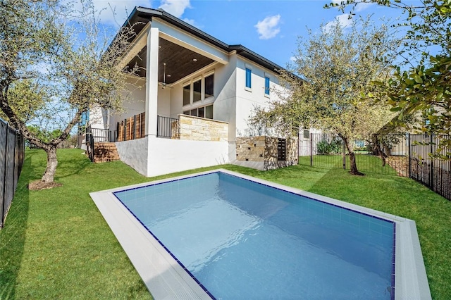 802 Serene Estates Dr, Austin, TX 78738 - rear view of property featuring stone siding, a fenced backyard, stucco siding, and ceiling fan