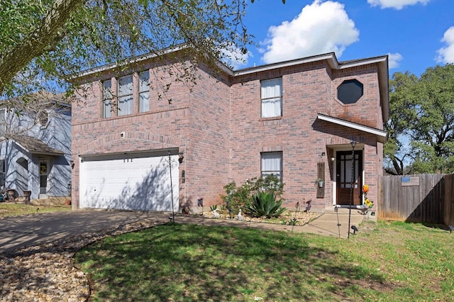 traditional-style house featuring brick siding, an attached garage, aphalt driveway, and fence