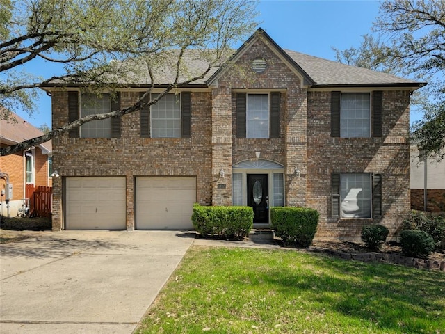 view of front facade featuring fence, concrete driveway, a front yard, a shingled roof, and brick siding