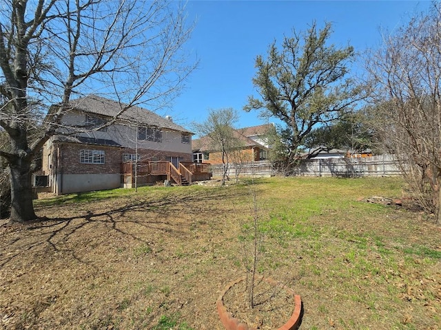 view of yard featuring fence