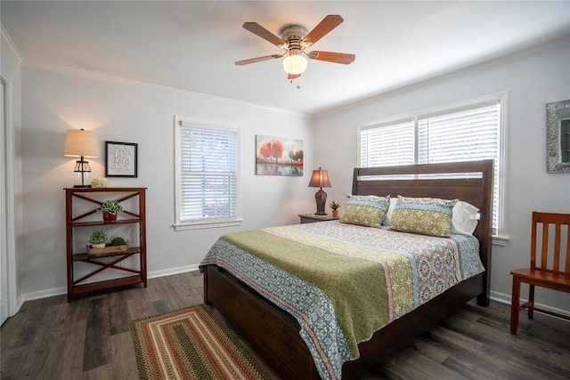 bedroom with multiple windows, baseboards, ornamental molding, and wood finished floors