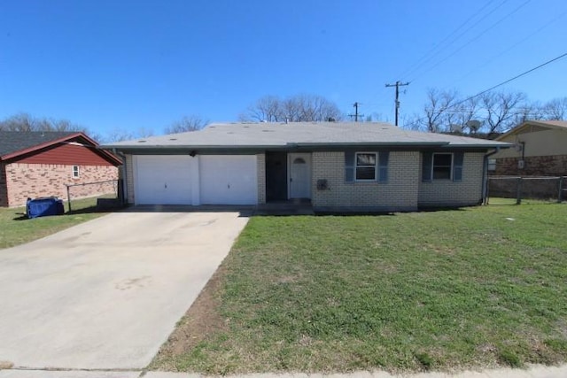 ranch-style home with a front yard, an attached garage, brick siding, and driveway