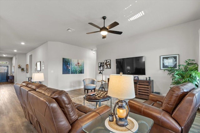 107 Freeman Day Dr, Bastrop, TX 78602 - living area with a ceiling fan, wood finished floors, baseboards, and recessed lighting