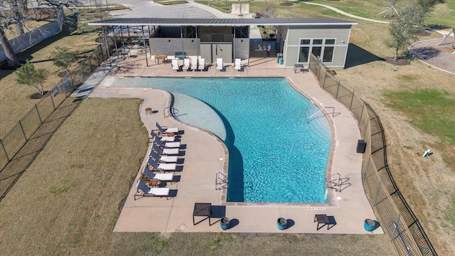 107 Freeman Day Dr, Bastrop, TX 78602 - community pool featuring a patio