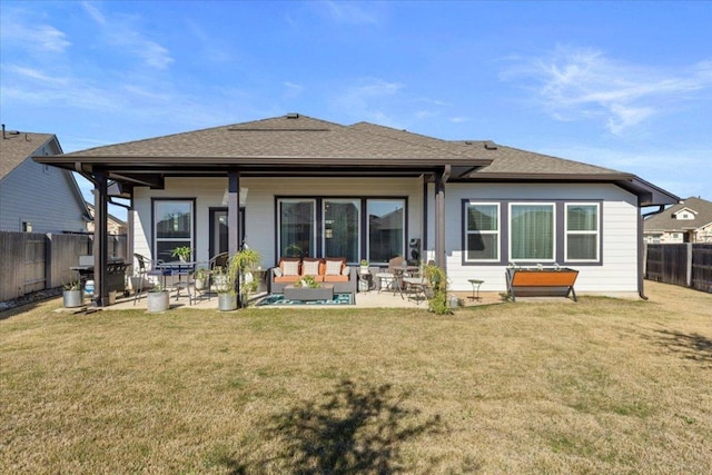107 Freeman Day Dr, Bastrop, TX 78602 - rear view of house featuring an outdoor hangout area, a fenced backyard, a patio area, and a shingled roof