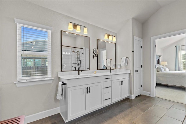 107 Freeman Day Dr, Bastrop, TX 78602 - bathroom featuring ensuite bath, a tile shower, plenty of natural light, baseboards, and vaulted ceiling