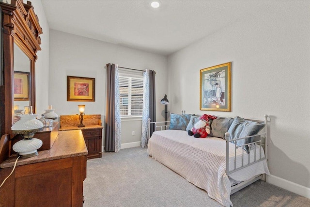 107 Freeman Day Dr, Bastrop, TX 78602 - bedroom featuring baseboards and light carpet
